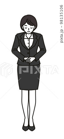 お辞儀をするスーツを着た女性 98135106