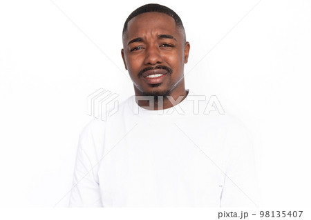 Dissatisfied young man showing irritation 98135407