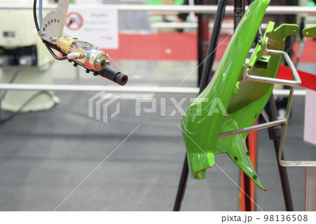 The high technology automotive paint work with painting robot. The high technology automotive paint work with painting robot. 98136508