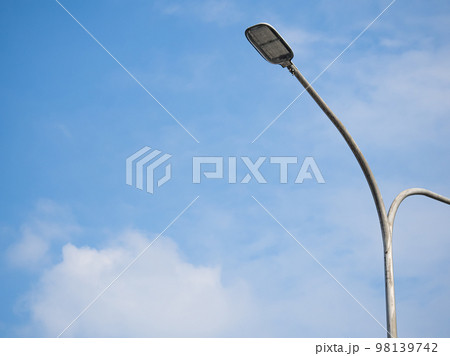 street lamp under blue sky. street lamp under blue sky. 98139742