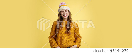 Outgoing stylish friendly-looking female employee tilting head smiling pleasant hold hands pockets jeans self-assured, expressing confidence determined reach success, yellow background Outgoing stylish friendly-looking female employee tilting head smiling pleasant hold hands pockets jeans self-assured, expressing confidence determined reach success, yellow background 98144070