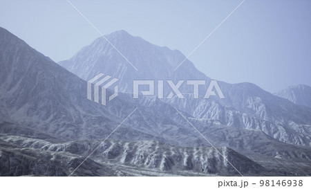 View of the Afghan mountains in fog 98146938