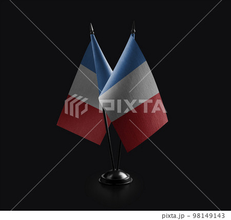 Small national flags of the France on a black background 98149143