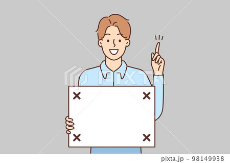 Smiling man with board in hands point up Smiling man with board in hands point up 98149938