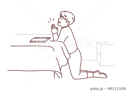 Small boy kneel pray at home  98151508