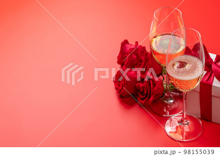 Valentines day card with champagne, rose flowers and gift box 98155039