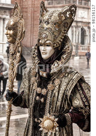 Colorful carnival masks at a traditional festival in Venice, Italy 98156117