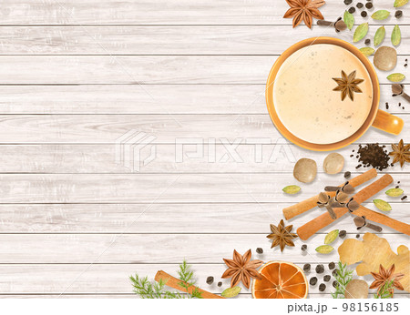 ウッドデッキの上にティーカップ、木の実や生姜、ドライフルーツなどスパイスの種類のイラスト背景素材 98156185