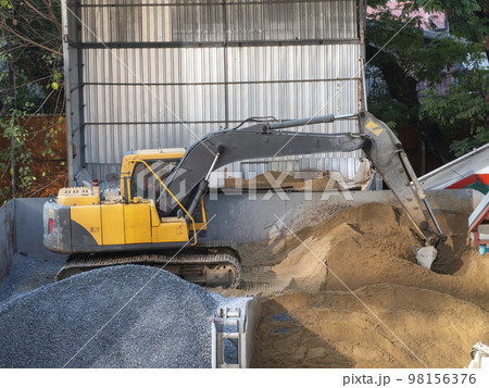 excavator in construction plant digging sand 98156376