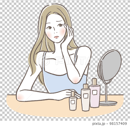 悩んだ顔でスキンケアをしている女性 98157409