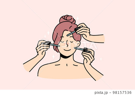Happy woman get facial treatment in spa 98157536
