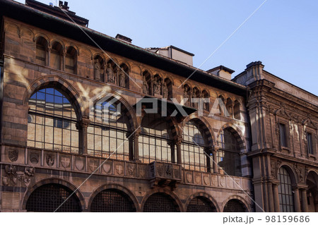 Millan, Italy Loggia degli Osii 1321 Gothic style historical building facade in Piazza Mercanti. 98159686