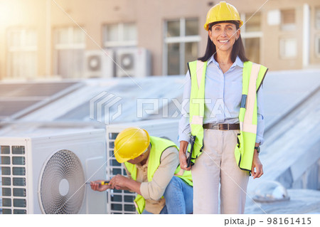 Air conditioner, building maintenance and teamwork with tablet, smile and development with engineer team. Engineering man, repair woman and digital tech in portrait with collaboration for ac repair 98161415