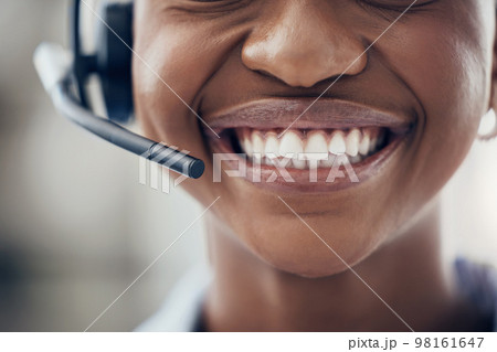 Black woman, teeth and smile with headset in call center, customer service or contact us at the office. Closeup of happy African American female consultant with toothy mouth smiling for telemarketing 98161647