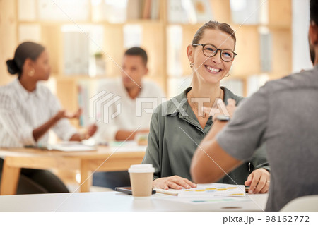 Collaboration, meeting and business people talking in the office with documents planning a project. Happy, smile and managers working on a report analysis together with paperwork in the workplace. 98162772