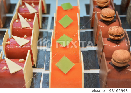 Chocolate cakes on display a confectionery shop in France. Chocolate cakes on display a confectionery shop in France. 98162943
