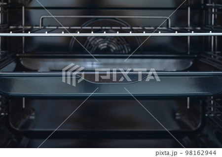 The inside of a stove oven 98162944