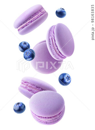 Flying macaroon cookies with fruits in the air, vertical, isolated on white background Flying macaroon cookies with fruits in the air, vertical, isolated on white background 98163835