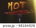 Hot chili peppers on fork. Extra spicy. Mexican food with pepper. Seasonings and spices. Hellish seasoning. 98164926