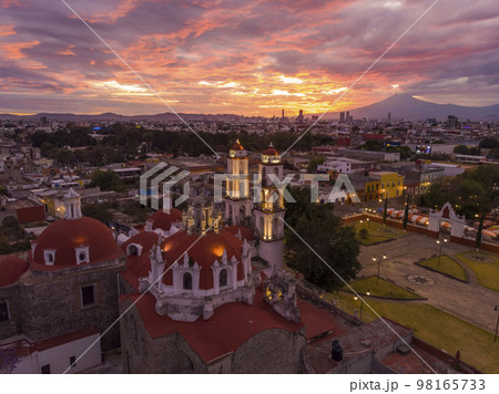 Puebla at Dramatic evening Sunset aerial drone shot of City Center in Puebla de Zaragoza, Puebla State, Mexico 98165733