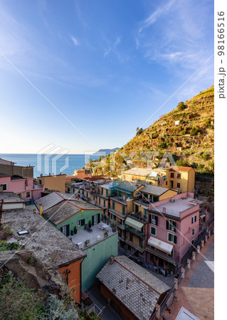 Small touristic town on the coast and farmland, Manarola, Italy. Cinque Terre 98166516