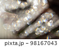 A fine white bokeh of blurry holiday glitter. 98167043