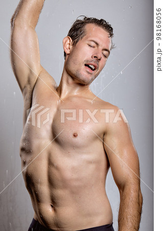 sexy muscular shirtless man isolated on gray studio background, portrait sexy muscular shirtless man isolated on gray studio background, portrait 98168056
