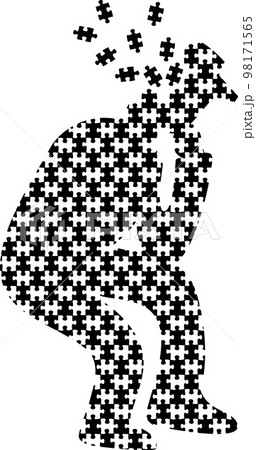 心身が病んでパズルピースのように崩壊していく男性のシルエット 98171565