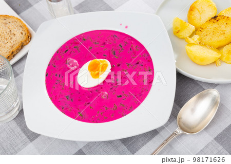 Appetizing traditional Belarusian cold vegetable soup Holodnik with cucumber and egg 98171626