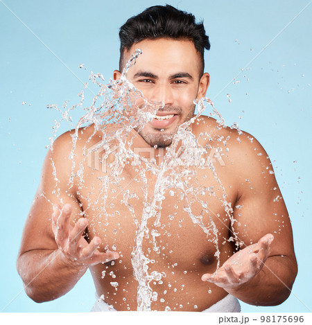 Cleaning, water splash and portrait of man happy with self care routine, facial hygiene and body hygiene wash. Water drop, bathroom skincare hydration and beauty model with health wellness treatment 98175696