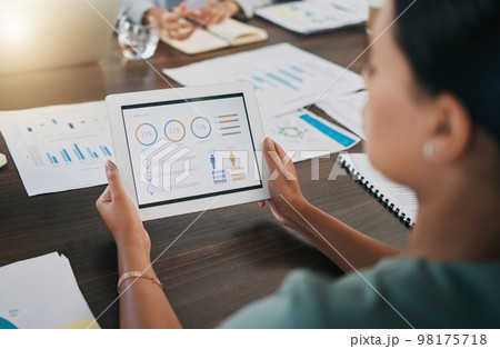Digital tablet, meeting and business people with paperwork planning a project with data, graphs and statistics. Technology, documents and team working on a corporate company strategy in the workplace 98175718