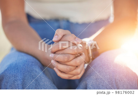 Woman, prayer hands or clasped together for depression help, burnout solution hope or religion routine. Zoom, nervous person fingers or mental health stress in psychology healthcare wellness or faith Woman, prayer hands or clasped together for depression help, burnout solution hope or religion routine. Zoom, nervous person fingers or mental health stress in psychology healthcare wellness or faith 98176002