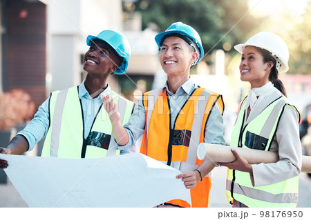 Blueprint, industrial and architects with smile for construction, building design and architecture on site together. Happy, creative and engineering workers with paper for renovation plan in the city Blueprint, industrial and architects with smile for construction, building design and architecture on site together. Happy, creative and engineering workers with paper for renovation plan in the city 98176950