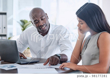 Businessman, black woman and documents in finance training, kpi data analysis and target audience research review with intern. Smile, happy and talking manager with laptop pointing at financial paper Businessman, black woman and documents in finance training, kpi data analysis and target audience research review with intern. Smile, happy and talking manager with laptop pointing at financial paper 98177281