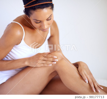 Woman, legs and natural skincare for hair removal, wellness or laser beauty. Female, leg and healthy skin care at home for body cosmetics, shine and epilation of soft aesthetic, glow or clean results Woman, legs and natural skincare for hair removal, wellness or laser beauty. Female, leg and healthy skin care at home for body cosmetics, shine and epilation of soft aesthetic, glow or clean results 98177713