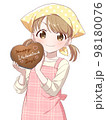 手作りバレンタインチョコを持つ女の子_得意げ 98180076