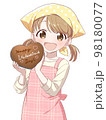 手作りバレンタインチョコを持つ女の子_笑顔 98180077