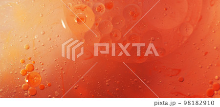 Gold and red Oil bubbles close up. circles of orange and pink water macro. abstract shiny background 98182910