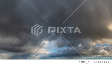 Fantastic thunderclouds at sunrise 98188451