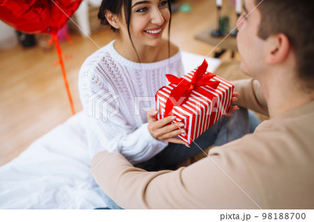 Valentine's Day concept. Happy couple in love with. Young loving couple celebrating Valentine's Day 98188700