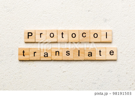 PROTOCOL translate word written on wood block. PROTOCOL translate text on cement table for your desing, concept PROTOCOL translate word written on wood block. PROTOCOL translate text on cement table for your desing, concept 98191503