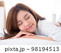 Beautiful young woman relaxing with closed eyes, waiting for massage in the home spa 98194513