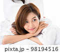 Home spa. Girl felling relaxing and enjoy time on the bed at the home spa. 98194516