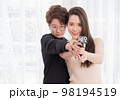 Young Asia LGBT teaches her girlfriend the backslider how to handle a weapon, firearm training at a firing range, in the bedroom 98194519