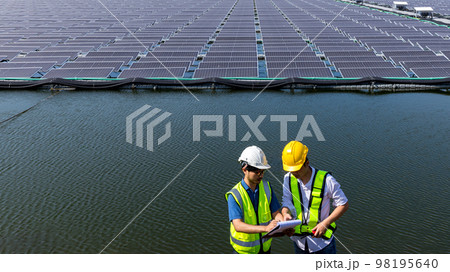 Engineer working setup Floating solar panels or solar cell Platform system on the lake. Engineer working setup Floating solar panels or solar cell Platform system on the lake. 98195640