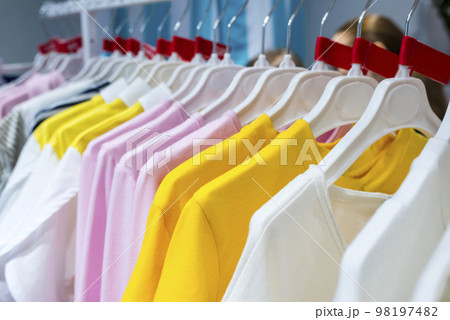 Clothes on hangers in a store. Shopping, shopping, discounts 98197482