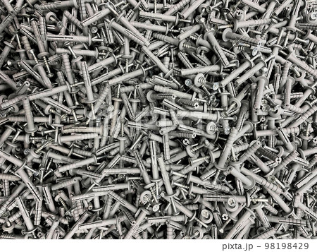 Drywall anchors with stainless steel screw. Background. Drywall anchors with stainless steel screw. Background. 98198429