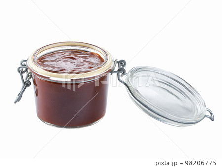 barbecue sauce in a glass jar isolated on white background. barbecue sauce in a glass jar isolated on white background. 98206775