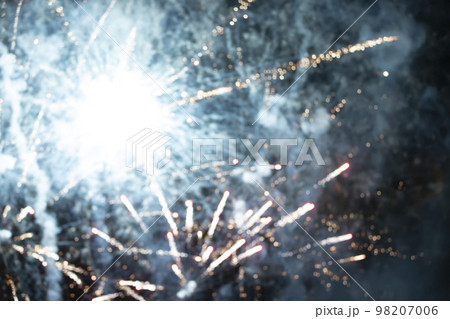 On a black background bokeh from explosions of colorful fireworks. On a black background bokeh from explosions of colorful fireworks. 98207006