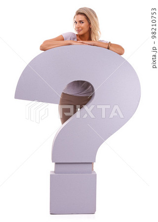 FAQ, portrait and woman with big question mark for business website or social media information on white background. Questions, answers and happy woman standing with question sign and info about us. FAQ, portrait and woman with big question mark for business website or social media information on white background. Questions, answers and happy woman standing with question sign and info about us. 98210753